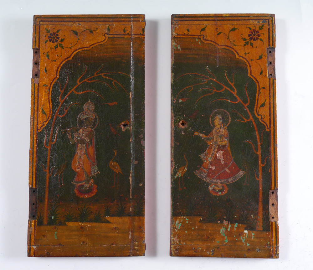 Appraisal: PAIR PAINTED INDIAN CABINET DOORS Paint decorated with figure on