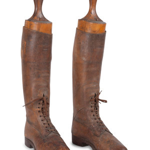 Appraisal: A Pair of Leather Lace Up Pull-On Men's Boots with