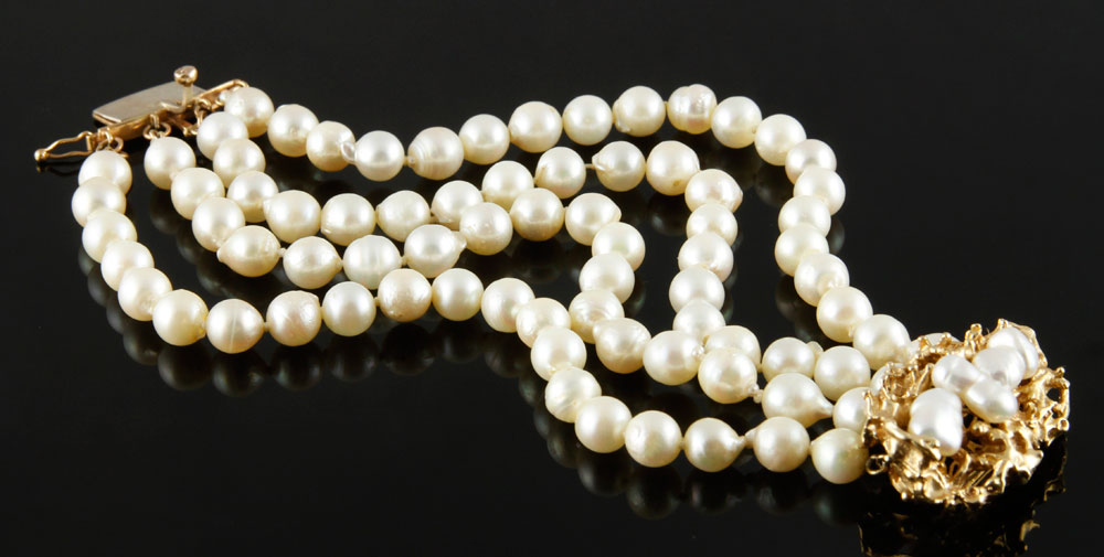 Appraisal: - Quardruple Strand Pearl Bracelet Quardruple strand pearl bracelet with