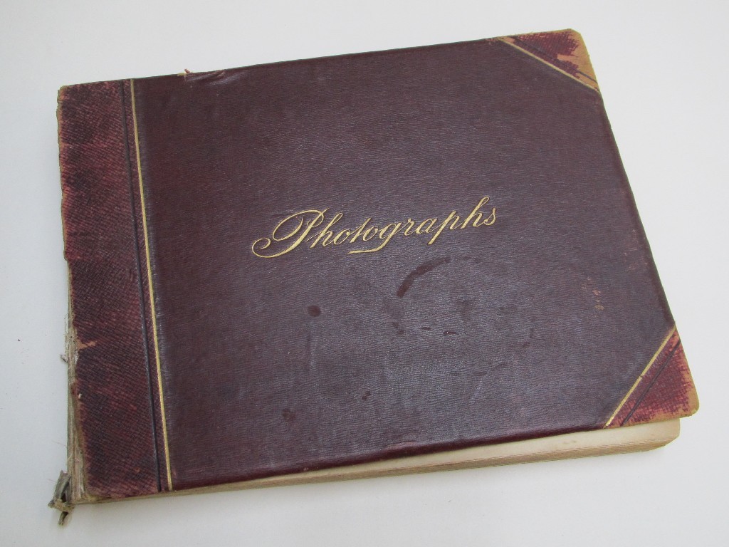 Appraisal: A Victorian photograph album comprising military company Aldershot Court of