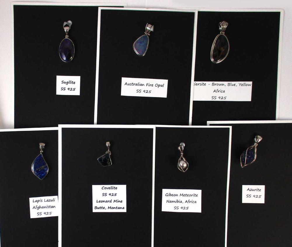 Appraisal: COLLECTION OF SEVEN SEMI-PRECIOUS GEMSTONE PENDANTS Each sterling silver pendant