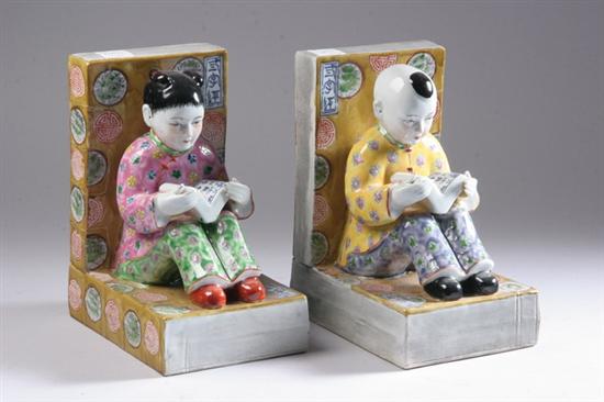 Appraisal: PAIR CHINESE FAMILLE ROSE PORCELAIN FIGURAL BOOKENDS late th century