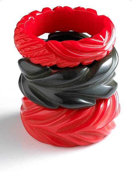 Appraisal: A collection of three bakelite carved leaf bangle bracelets comprising