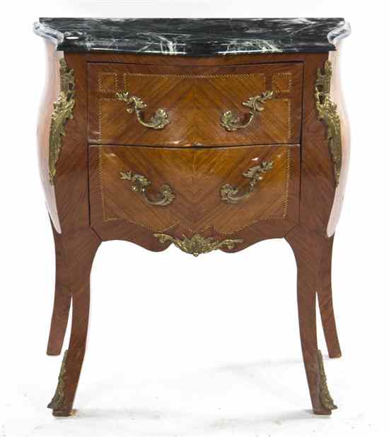 Appraisal: A Louis XV Style Bombe Form Commode having an associated