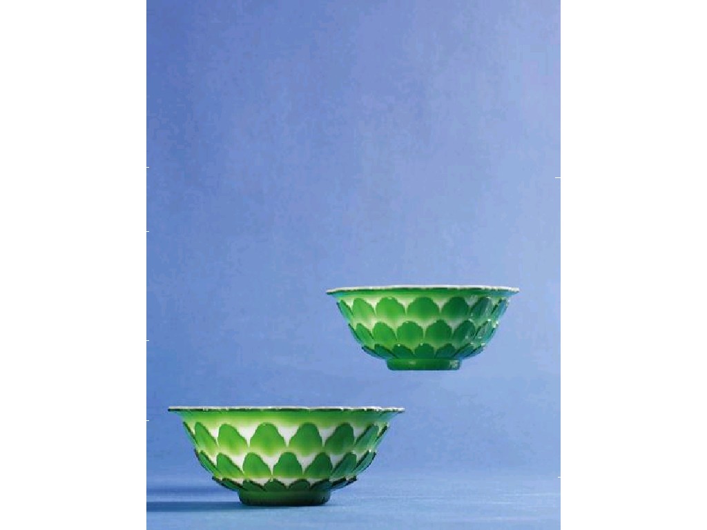 Appraisal: A PAIR OF PEKING GLASS BOWLS in the form of