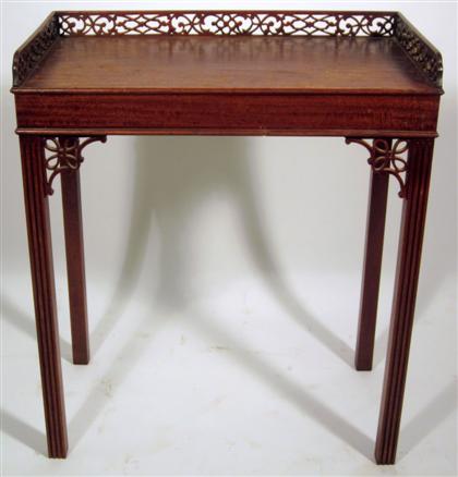 Appraisal: George III Chinese Chippendale style mahogany side table th century