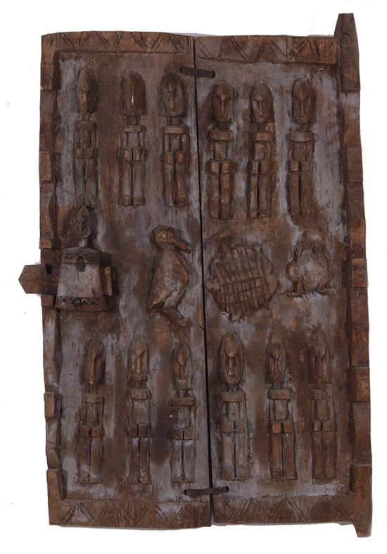 Appraisal: Primitive carved wood panel verso bearing old gallery label H