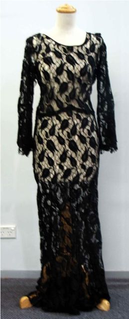 Appraisal: s black evening dress in ecru lace Provenance Peter Marsden