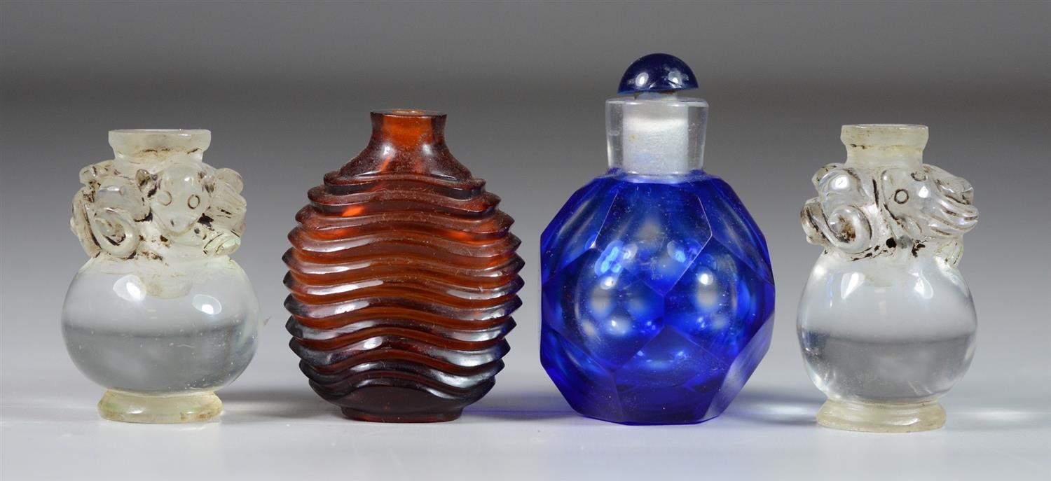 Appraisal: Carved Peking glass Chinese snuff bottles clear with dragon around