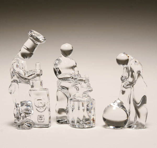 Appraisal: Three Swedish Orrefors glass figures representing a baker glassblower and