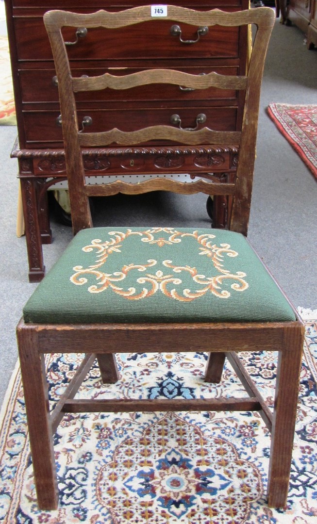 Appraisal: A set of eight th century style oak ladder back