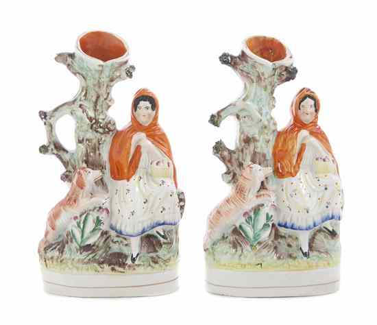 Appraisal: Two Staffordshire Figural Spill Vases each depicting Little Red Riding