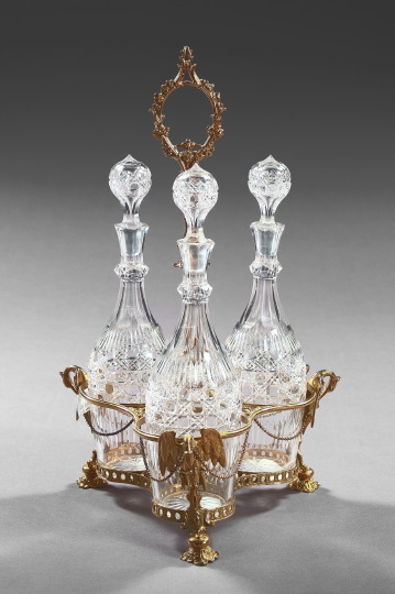 Appraisal: Good English Gold-Plated Decanter Frame fitted with a trio of