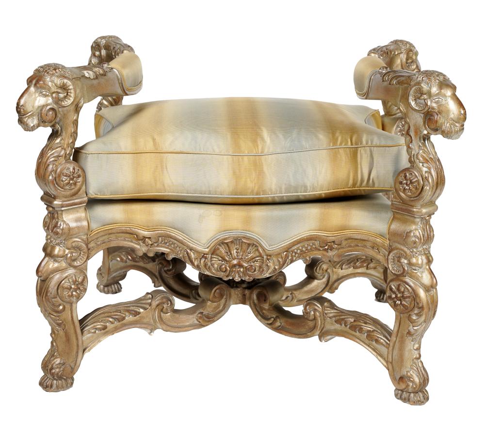 Appraisal: CARVED GILTWOOD BENCHmodern carved with ram's head motif loose seat