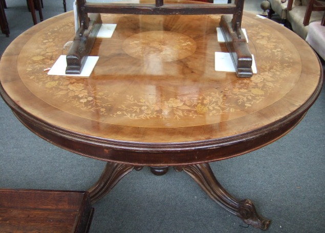 Appraisal: A th century walnut centre table the circular top with