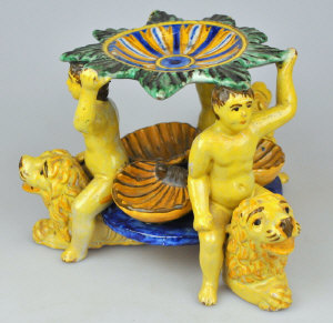 Appraisal: Italian early th century majolica table salt formed as three