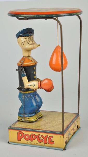 Appraisal: Chein Tin Litho Wind-Up Popeye Bag Punching Toy Original bag