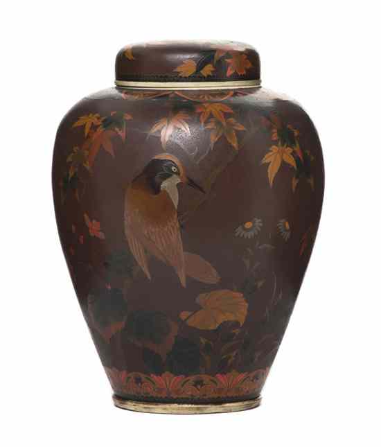 Appraisal: A Japanese Cloisonne and Porcelain Lidded Jar having enameled decoration