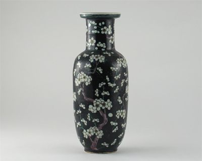 Appraisal: A Chinese famille noire cylindrical vase decorated with flowering prunus