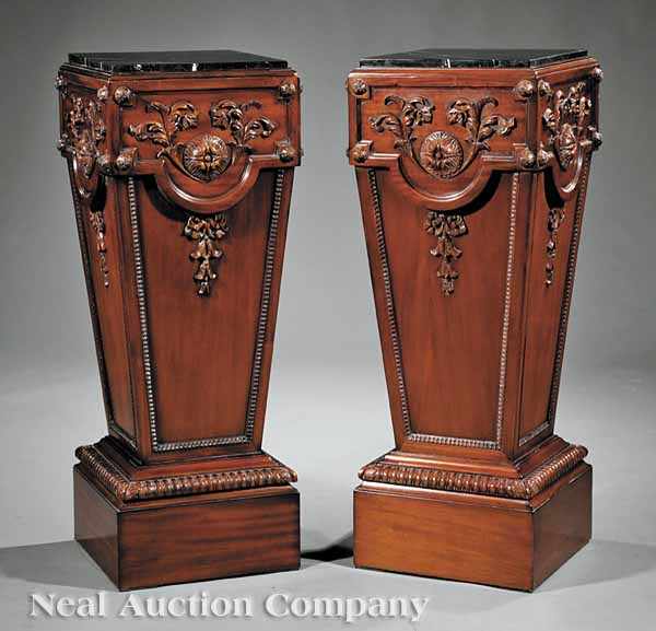 Appraisal: A Pair of Neoclassical-Style Carved Mahogany Pedestals inset marble tops