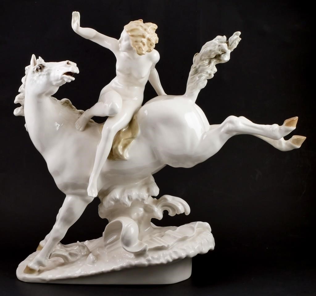 Appraisal: Porcelain figural group of a nude woman on a leaping