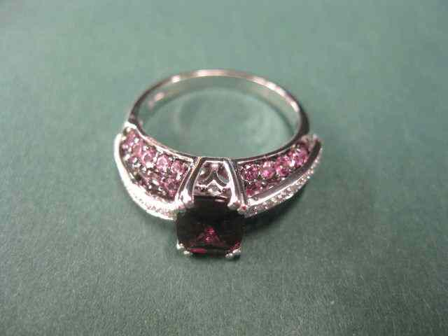 Appraisal: Garnet Diamond Ring carat emerald cutrhodolite gem with smaller gems