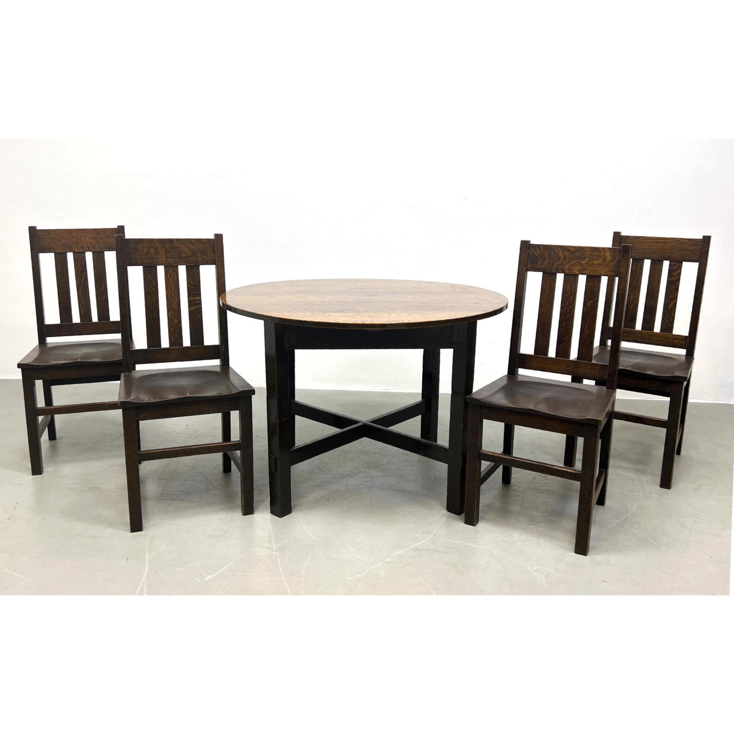 Appraisal: National furniture mission oak Dining table and four chairs Four