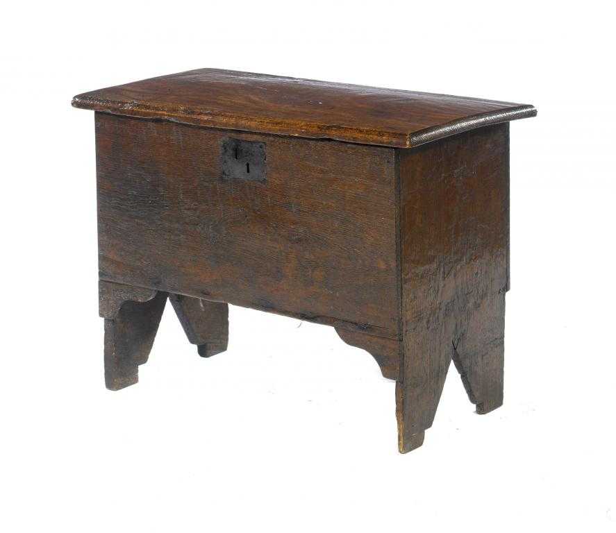 Appraisal: AN OAK CHEST of boarded construction with trestles and iron