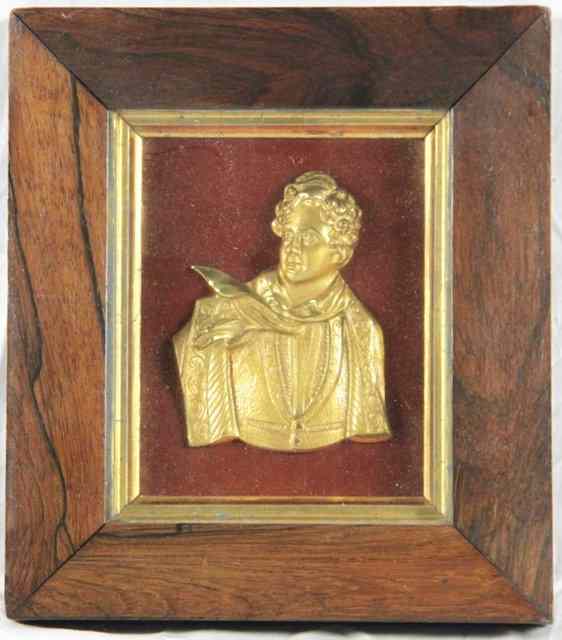 Appraisal: A gilt metal relief half length portrait of a gentleman