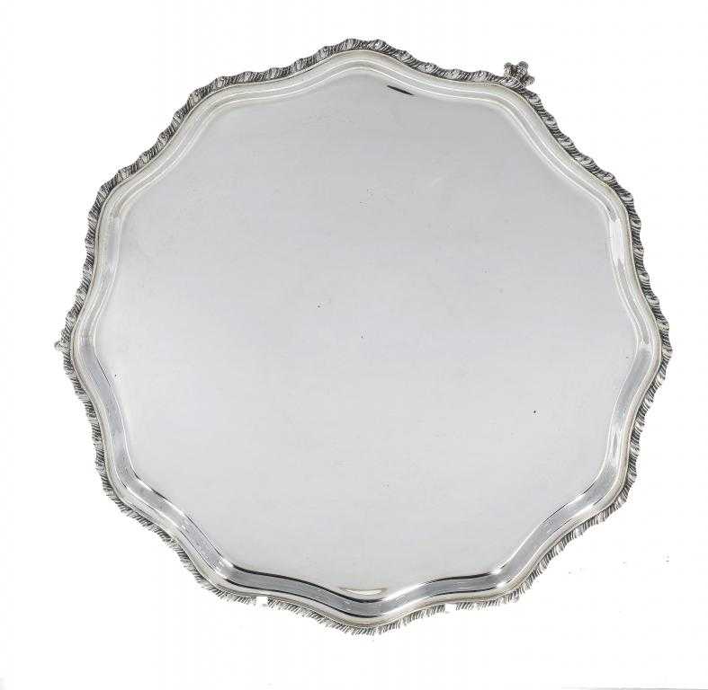 Appraisal: A GEORGE V SALVER with serpentine border and gadrooned rim