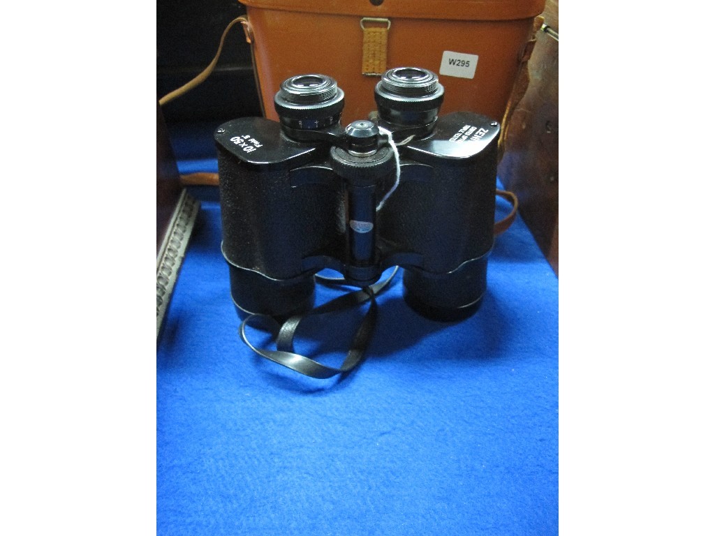 Appraisal: A pair of Zenith x binoculars in case Provenance Viscount