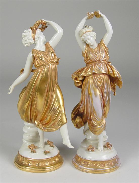 Appraisal: Pair of Dresden Gilt Figures Ladies with gold lustre gowns