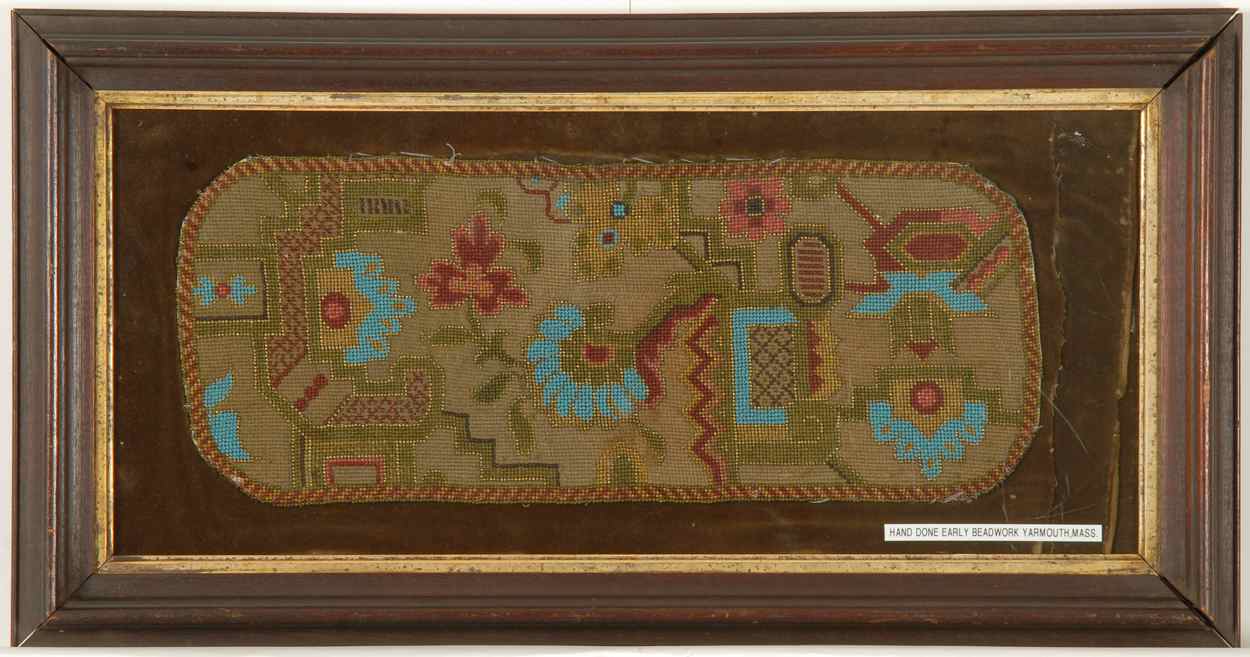 Appraisal: FRAMED BEADED TABLE MAT In a floral design similar to