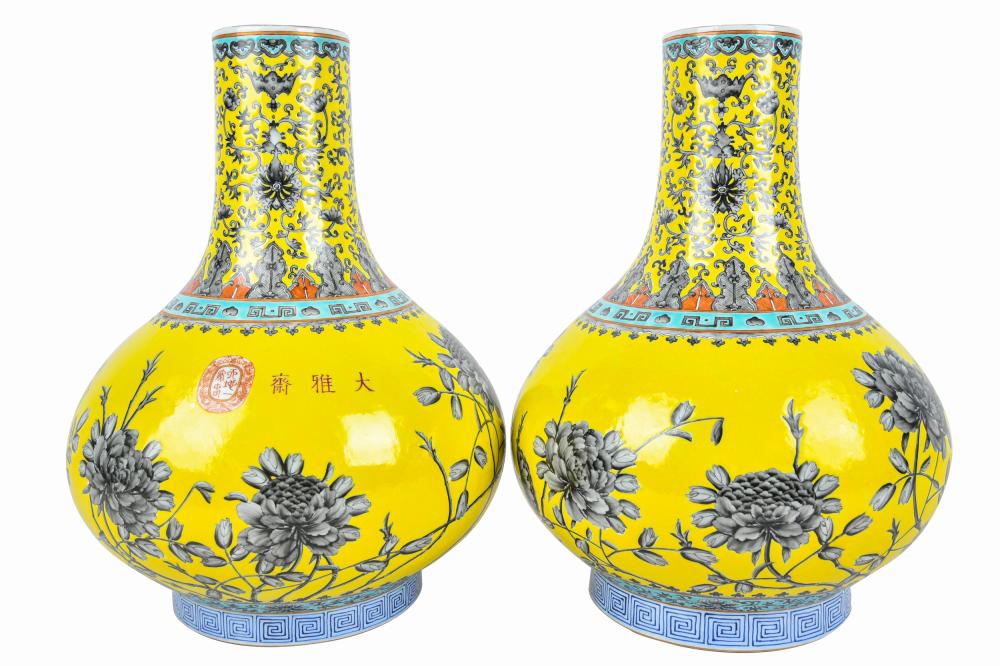 Appraisal: PAIR OF CHINESE YELLOW-GROUND PORCELAIN VASESeach with four-character mark to