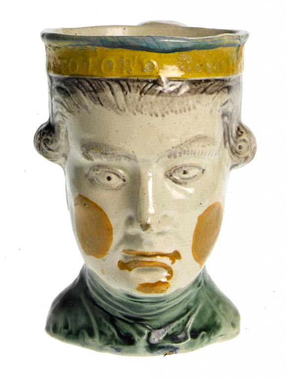 Appraisal: A PRATTWARE RODNEY MUG moulded as the head of the