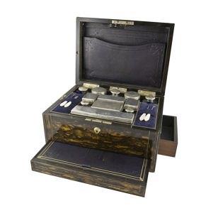 Appraisal: A mid Victorian coromandel dressing case with brass stringing and