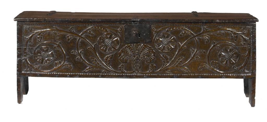 Appraisal: A CHARLES I BOARDED OAK CHEST with trestle ends the