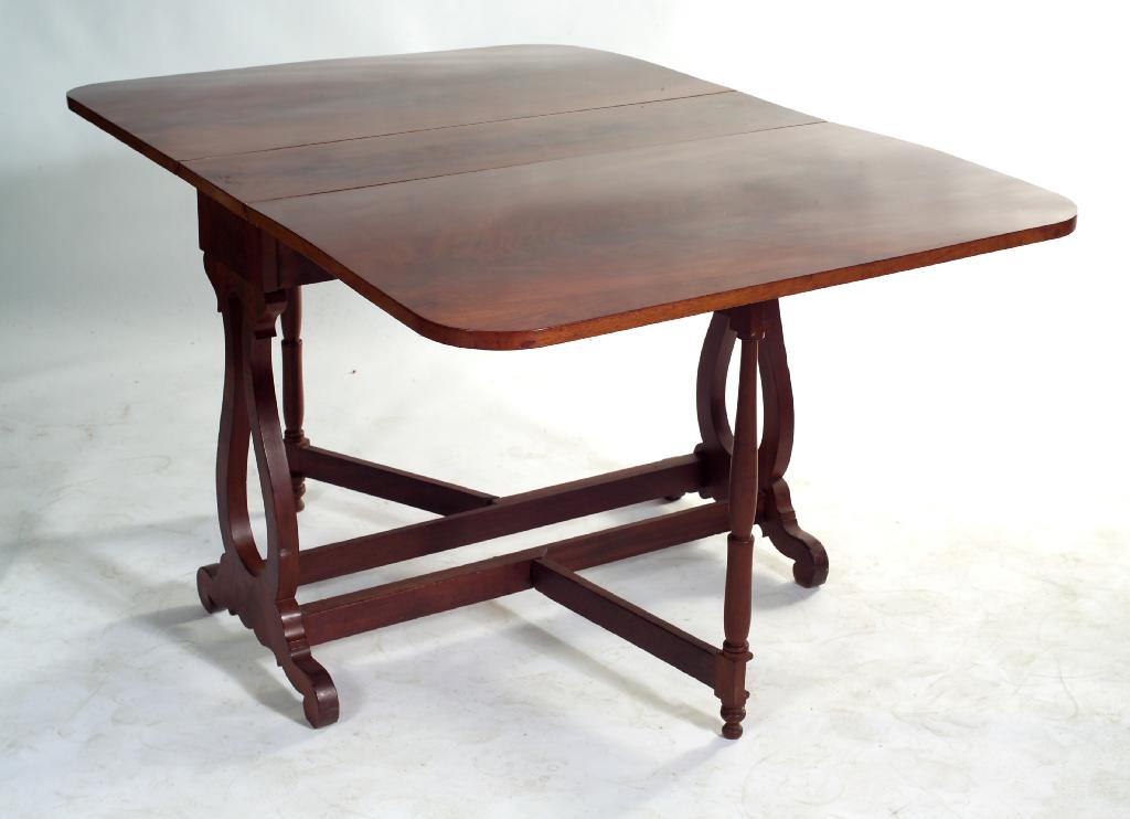 Appraisal: REGENCY STYLE FLAME MAHOGANY GATELEG DINING TABLE c the rounded