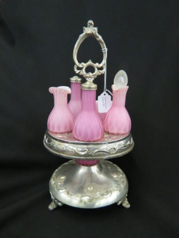 Appraisal: Silverplate Castor Set cranberry diamond quilted castors center handle