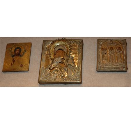 Appraisal: Group of Three Russian Style Metal Mounted Icons Estimate -