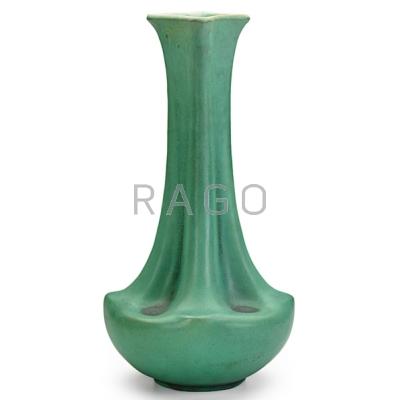 Appraisal: TECO Tall bulbous lobed vase matte green glaze pooled charcoaling