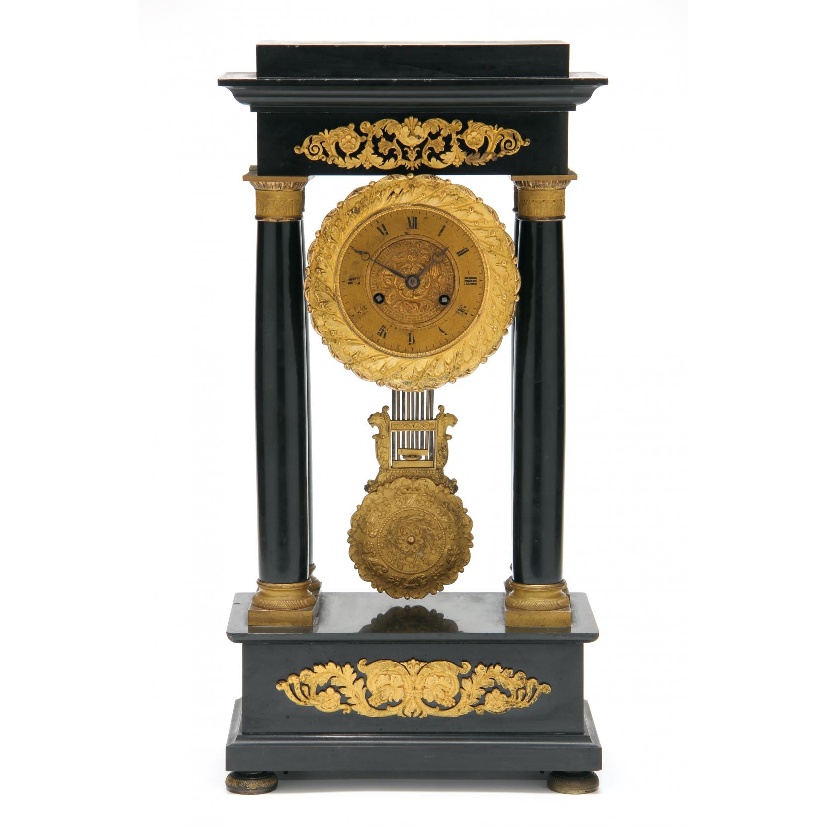 Appraisal: French Empire Marble Portico Clock th century polished black stone