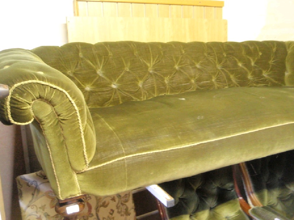 Appraisal: A Victorian Chesterfield sofa with buttoned green velvet upholstery and