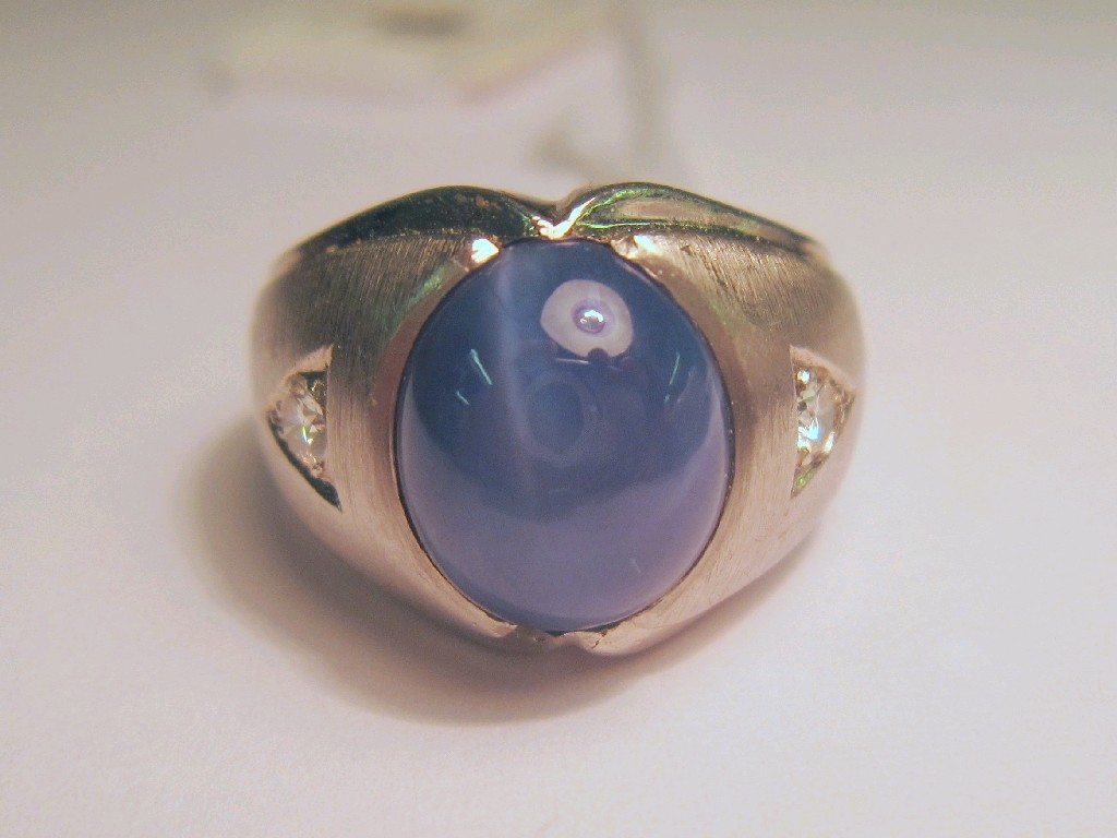 Appraisal: Fourteen carat white gold star sapphire and diamond set dress