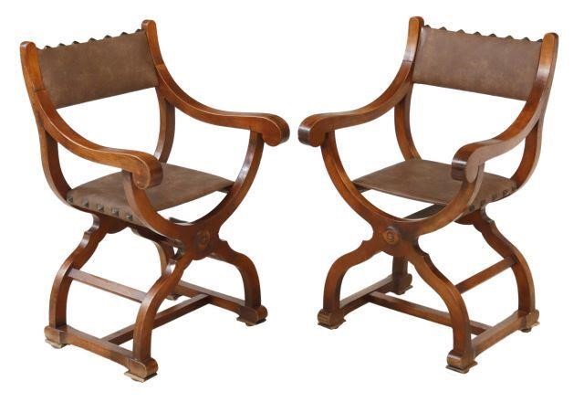 Appraisal: pair Neoclassical style curule armchairs th c faux leather upholstered