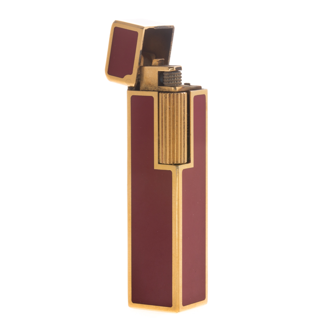 Appraisal: A Red Enamel Lighter by Cartier karat yellow gold plated