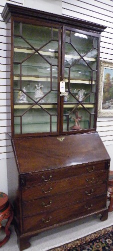 Appraisal: GEORGE III MAHOGANY SECRETARY BOOKCASE English early th century The