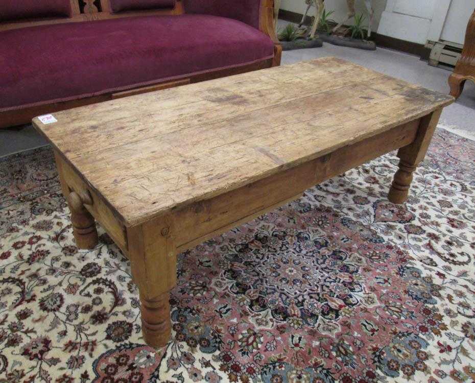 Appraisal: COUNTRY PINE COFFEE TABLE Continental th century having a rectangular