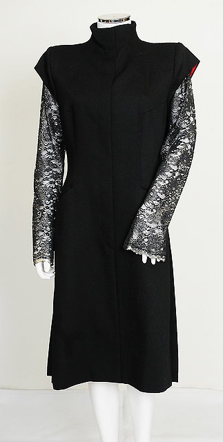 Appraisal: A Alexander McQueen black wool coat with silver and black