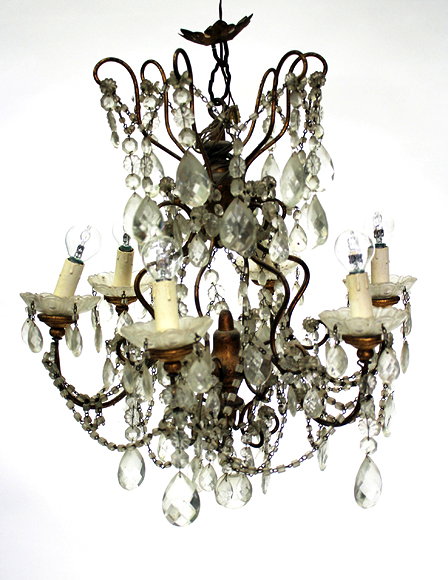 Appraisal: A GILT METAL SIX LIGHT ELECTROLIER with swags of glass